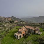 Farmhouse/Rustico - Cinigiano. Rustico in need of renovation in a panoramic location