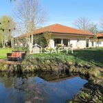 Belle villa d'architecte avec jardin paysagé au calme à la campagne.