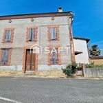 Maison de village à rénover avec jardinet et garage non attenant