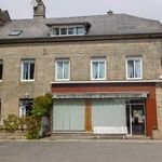 CORREZE. Bugeat. Stone house with 7 bedrooms, 2 courtyards and large shop/salon.