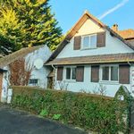 Pavillon avec garage et jardin