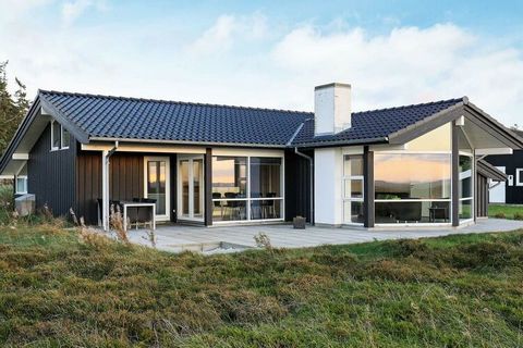 Holiday home with whirlpool and sauna located by the Limfjord with the most beautiful panoramic view of the fjord and the scenic area from both house and grounds. The house is modernly furnished, and in all rooms with tiles there is underfloor heatin...