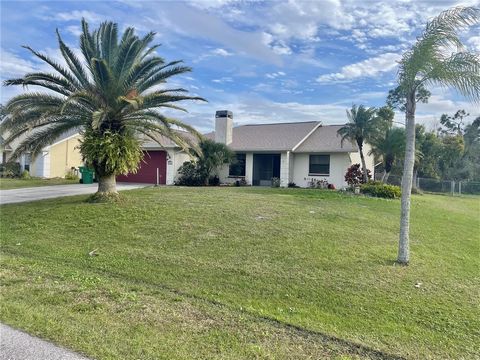 Welcome to this well maintained residence nestled in the heart of Port Charlotte, Florida. Built in 1991, this home offers a perfect blend of location and modern convenience. You'll be greeted by the spacious 1,657 square feet of living space, adorne...
