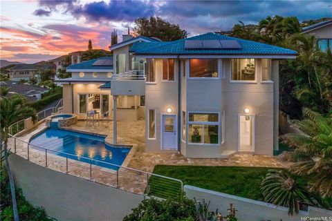 Welcome to a paradise of refinement and elegance. This exquisite Hawaii Loa Ridge home redesigned and remodeled is a masterpiece of modern luxury living. Enjoy breathtaking, unobstructed 180-degree ocean views from every room. Wake up to the soothing...