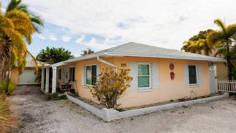 LOCATION, LOCATION, LOCATION... Discover this exceptional duplex nestled in sought-after St. Pete Beach – a prime investment opportunity with a sophisticated appeal and low maintenance requirement. Positioned within walking distance of pristine beach...