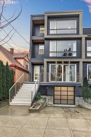 Live the N Portland lifestyle! This must see property is close to all the hot spots and good eats on N Williams and N Vancouver! This stunning contemporary dream home with sophisticated finishes features hardwood floors throughout, high ceilings, mul...