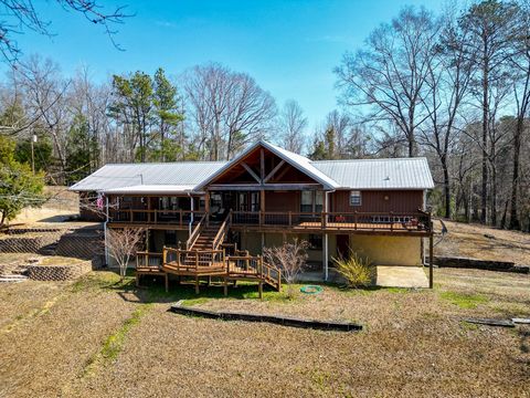Gorgeous 3 bed/3 bath home with incredible views of the Tenn-Tom Waterway! Enjoy the afternoon sunsets on the expansive back deck! This home offers 2 separate living areas and would be perfect for an in-law suite or Airbnb rental property! Water acce...