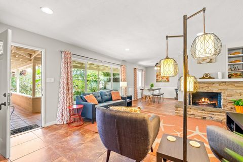 Discover the allure of Palm Desert living with this captivating mid-century residence, ideally situated near the vibrant shops and eateries of El Paseo. Boasting 2 bedrooms and 2 baths in the main dwelling, this home offers a blend of comfort and pot...