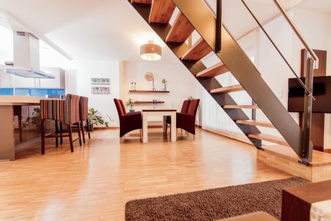 The duplex apartment with 3 balconies and a castle view in Heidelberg's Old Town is a unique gem that combines historic charm with modern comfort. Upon entering the apartment, a staircase leads to the upper floor where the sleeping area is located. T...