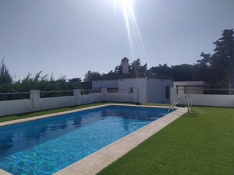 Plot of 1100m2 for sale close to beach with house and covered terrace of 100m2 along with garage of 20m2 and some outhouses. The house (70m2) contains two bedrooms, bathroom along with open plan living and kitchen area and attached is a covered terra...