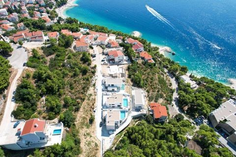 Absolutely unique - stunning new villa within new condo in Baska Voda, just 150 meters from beautiful pebble beaches and romantic promenade along the beach stretching to Brela! Villa benefits indoor and outdoor swimming pools, jacuzzi, gym with billi...