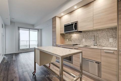 Check Out This Meticulously Maintained Unit With Loads Of Builder Upgrades Throughout, Including Smooth Ceilings, Luxury Vinyl Throughout, Upgraded Bathroom Walls and Flooring and Built In Kitchen Drawers. Stunning Sun Filled Unit Facing South With U...