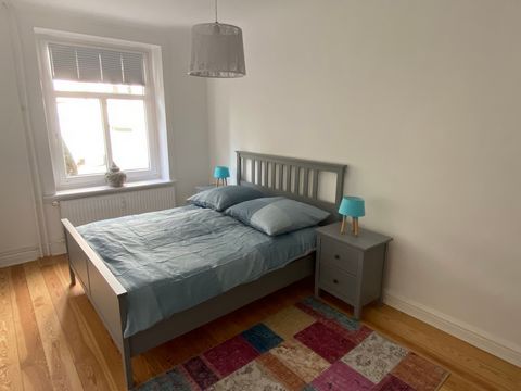 The completely renovated four-room apartment on the mezzanine floor of a red brick old building has bright, freshly refinished plank floors. The bathrooms are tiled in white and in the kitchen a vinyl floor was laid. There are two corridors in the ap...