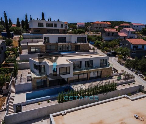 Super luxurious and modern villa on two floors in Okrug Donji, in the fifth row to the sea. New construction, with 332 m2 of living space, outdoor heated pool of 22 m2 and a very landscaped garden of about 450 m2. On the villa ground floor are situat...