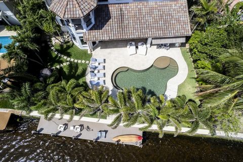 Indulge in the allure of this stunning gated estate perched gracefully along the serene Intracoastal Waterway, where Eastern exposure and a peaceful ambiance render transportation obsolete. Expertly reimagined by a distinguished designer and meticulo...