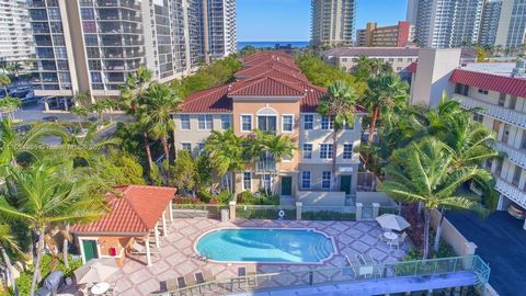 Hidden Gem in Hallandale Beach! This unique 3 level townhouse has direct intercoastal views from every floor. A totally remodeled residence with 10-foot ceilings offers open floor plan, with lots of natural light. Elegant white porcelain tile floors ...