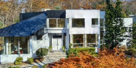 Discover the epitome of modern luxury living in this custom contemporary masterpiece, artfully inspired by the renowned architect Richard Meier. Nestled in the prestigious Indian Hills neighborhood, this home is a true work of art that harmonizes des...