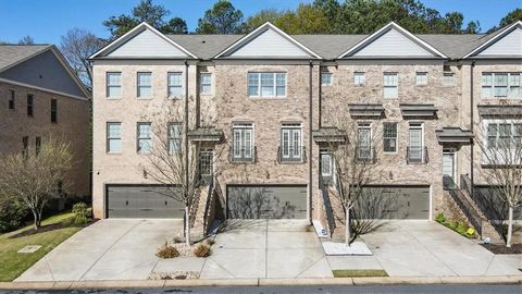 Welcome to your elegantly appointed townhome in the serene Cambridge Walk, ready for immediate move-in. This home artfully combines sophistication with an inviting warmth, featuring an open floor plan that seamlessly integrates polished hardwood floo...