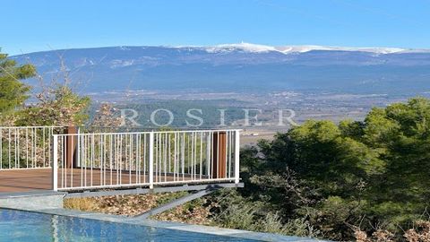Perched on the heights of the village of Blauvac, facing the Giant of Provence, stands a modern house, totally open to nature. The terraces, suspended like pontoons, offer an enchanting spectacle in all seasons, as you admire the panoramic view of Mo...