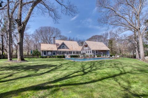 In the sought-after beach community of Sag Harbor's North Haven Point, this 4-bedroom, 4.5-bath home with a wrap-around porch, decks, and heated pool is set on 1.8+/- bucolic acres. Enter through the covered porch into the foyer, cozy den/study, form...