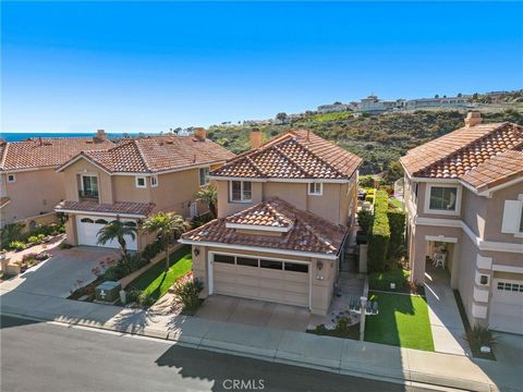 Nestled within Monarch Beach's prestigious guard-gated community of Ritz Pointe, this meticulously maintained property commands attention from its premier front row position, offering sweeping ocean and golf course views. The lower level of this resi...