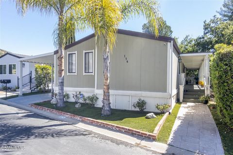 Welcome to Calabasas Village! This charming mobile home is the perfect condo alternative, offering the comfort and convenience you desire. Step inside to discover a spacious 2-bedroom, 2-bathroom haven with an inviting open floor plan adorned with be...