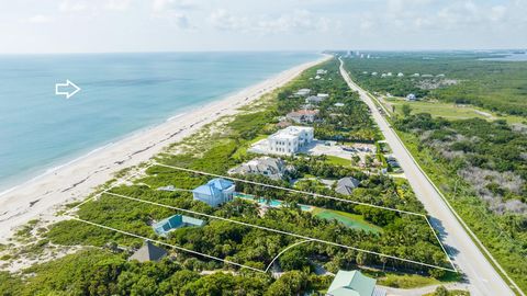 This rare offering presents a unique opportunity to own an extensive oceanfront compound in the exclusive Vero Beach Estate Section. This walled, gated, stormproofed oceanfront residence with extensive gallery wall space, 12-car auto salon for the co...