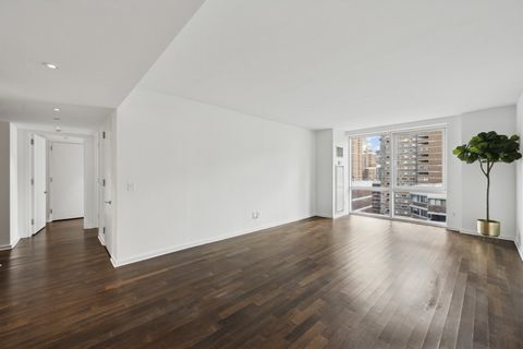 Happy New Year and welcome to Apartment 12E at 340 E 23rd Street, a pristine 2-bedroom, 2- bathroom corner residence that defines modern elegance in the heart of Gramercy. With 1,280 square feet of bright, open living space, this home offers a seamle...