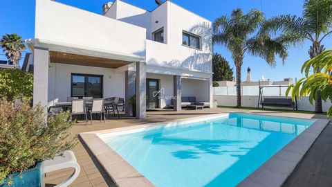 Located in Lagoa. Discover This Dream Villa in Carvoeiro, Algarve As you step into this magnificent villa, fully renovated to the highest standards, you are welcomed by a spacious entrance hall with double-height ceilings, bathed in natural light. Th...