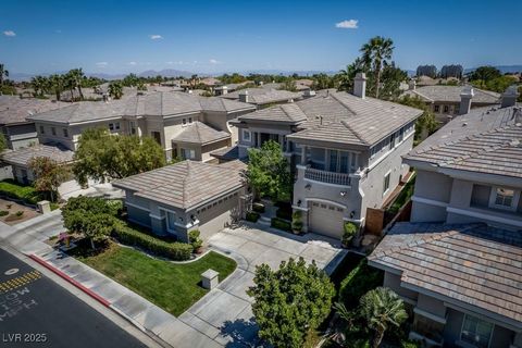 This incredible home with primary bed down in Guard Gated Eagle Rock Community of Summerlin lives like a one story. This gem boasts a whopping 3,556 square feet, meticulously maintained, both inside and out. Step into the spacious living room with it...