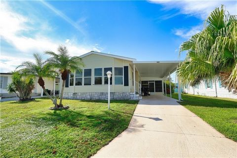 2-bedroom, 2-bathroom home in the heart of Barefoot Bay! This 1,360 sq ft, 2005-built gem is move-in ready and offers a spacious layout perfect for comfortable living. The bright Florida room provides extra space to relax or entertain, while the spli...