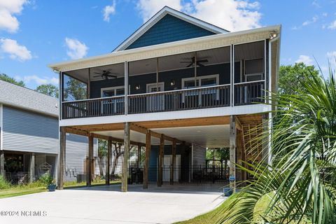 LIMITED TIME Price Reduction!! Welcome to your serene coastal retreat at 144 NE 4th Street, nestled in the tranquil harbor of Oak Island, NC. This charming home offers the perfect blend of comfort, convenience, and coastal living.As you step inside, ...