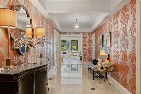 Welcome to this luxurious corner co-op nestled a block from Central Park and the Guggenheim, a regal 4-bedroom, 4-bathroom home graced with an expansive winged layout, three exposures, and gorgeous details throughout.A semi-private elevator landing u...