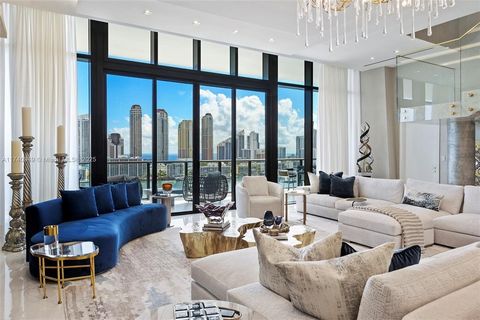 Step into extraordinary luxury with this two-story corner penthouse at Prive, a prestigious private island enclave. Spanning over 6,000 sq. ft., this 6-bedroom, 7 full and 2 half-bath residence features dramatic 15-foot ceilings and offers stunning v...