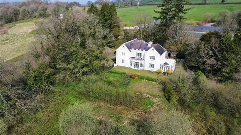 This beautiful period country house occupies an elevated south facing setting just three miles from the popular market town of Llandeilo. The spacious five bedroom, five reception room home enjoys a wealth of period features whilst stands approximate...