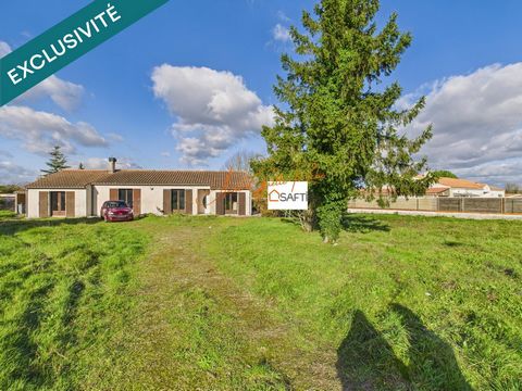 Maison plain pied 123 m² avec double garage attenant.