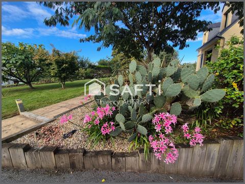 Maison avec jardin clôturé en plein centre bourg.
