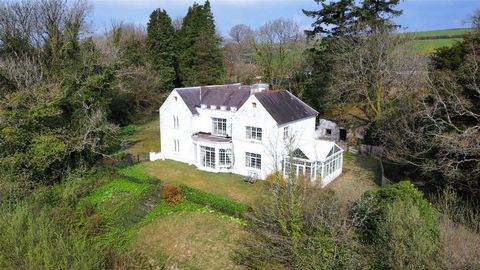This beautiful period country house occupies an elevated south facing setting just three miles from the popular market town of Llandeilo. The spacious five bedroom, five reception room home enjoys a wealth of period features whilst stands approximate...