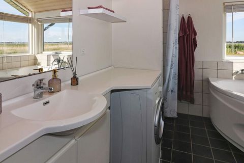 A holiday cottage with a whirlpool and sauna and a lovely view of the fjord and only 75 metres from the water. You can also enjoy this view from the whirlpool. The house is bright and well-arranged, and you can see fjord from almost all rooms. The li...