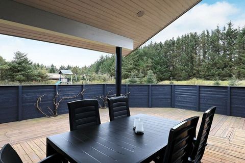 Modern holiday cottage with whirlpool located at Grønhøj Strand. Tasteful, personal furnishings and large, bright rooms. The house was renovated in 2014 and has open concept kitchen and living room, 3 bedrooms, mezzanine and a bathroom. The furnishin...