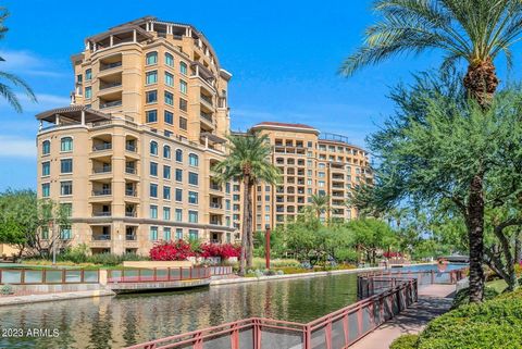 Experience the ultimate high-rise luxury lifestyle at the prestigious Scottsdale Waterfront. This exquisite home is Tree Top Level and very quiet and private. The spacious one bedroom, two bath is significantly larger than some 2-bedroom Waterfront u...