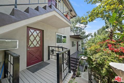 Trophy Property....A rare opportunity to own an income property in one of LA's hottest neighborhoods. Spectacular and secluded mid-century 4plex set high in the hills on a large lot north of Sunset in Echo Park. Magnificent views of downtown, Griffit...