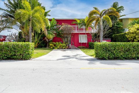 Welcome to this exquisitely designed home located in beautiful Port Antigua. This is an entertainer's delight featuring marble flooring throughout the home. It boasts 2 full kitchens, one of which is outdoors so you can bring your fresh catch in from...