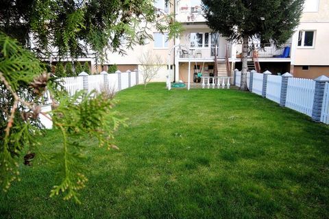Large, comfortable holiday apartment. At guests' disposal: living room, 2 bedrooms, well-equipped kitchen, bathroom with shower, washing machine, toilet, balcony and a private, landscaped garden with a barbecue, garden furniture, sandbox and swing. G...