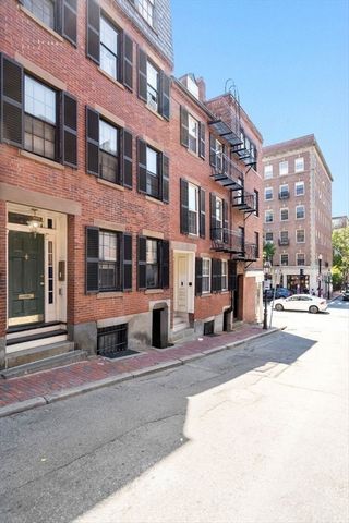 Welcome to 102 Revere Street, a true blue chip asset! Located steps away from coveted Charles street, this building features 4 units that include- one parlor level 2 bedroom 2 bath duplex with private court yard and three one bedrooms that include pr...