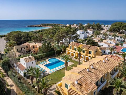 Attention Investors! Tourist complex with 20 apartments in Cala'n Bosch. This exclusive standalone complex boasts a large swimming pool and landscaped gardens, with the apartments spread across two buildings. One houses a total of 12 apartments, whil...