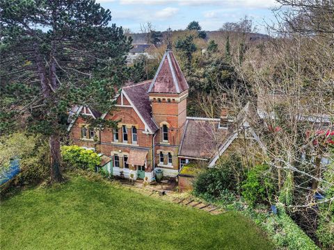 Immerse yourself in history and charm within this captivating Grade II Listed home, the larger part of a former station house. Nestled amidst the Surrey Hills Area of Outstanding Natural Beauty this unique property offers breathtaking panoramic views...