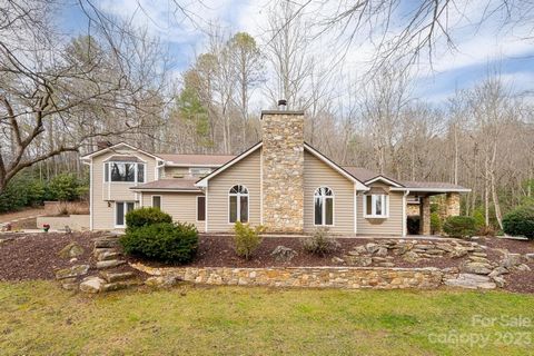 Welcome to your secluded mountain sanctuary, gracefully perched on 22.5 acres near the charming town of Brevard, NC. This 4,000 sq ft bespoke home embodies rustic elegance, diligently restored to superior standards, presenting a distinct mix of cozin...