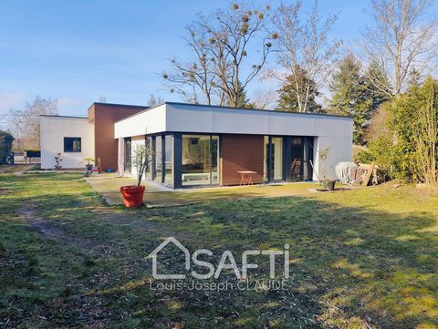 Located 5 minutes from the banks of the Loire River and the A10 highway, this contemporary architect-designed house offers single-story living with 248m² of beautiful volumes on a 1500m² plot, suitable for a pool and with no overlooking neighbors. Th...