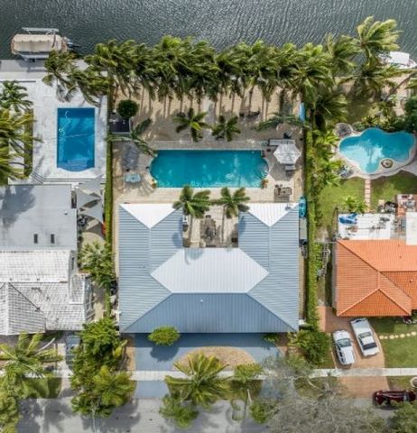 Your Riviera Awaits! A modern oasis, perfect for those seeking a high-end waterfront lifestyle. This exclusive home is situated on a 11,250 sf lot with 75 ft of frontage ideal for boating enthusiasts. Impact windows, doors & metal roof contribute to ...